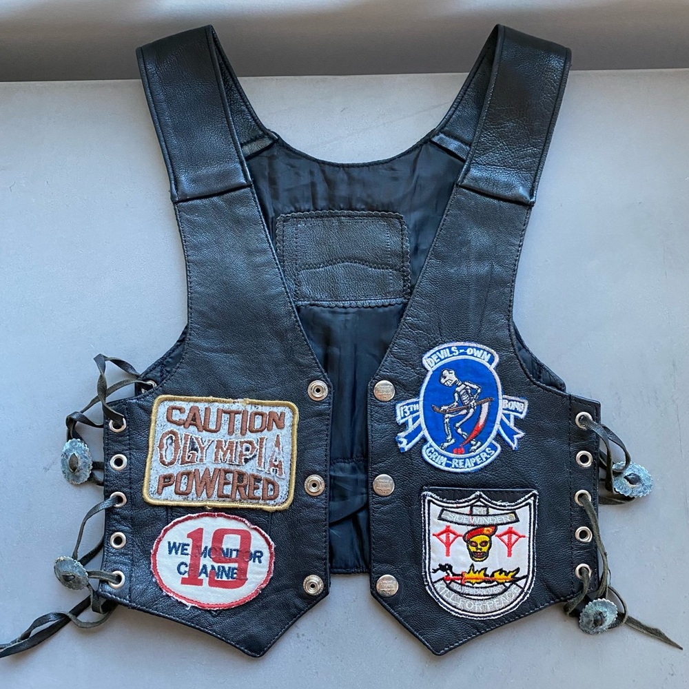 Vintage 60s 70s Crop Leather Lace Up Patches Vest biker metal boho Agatha NYC